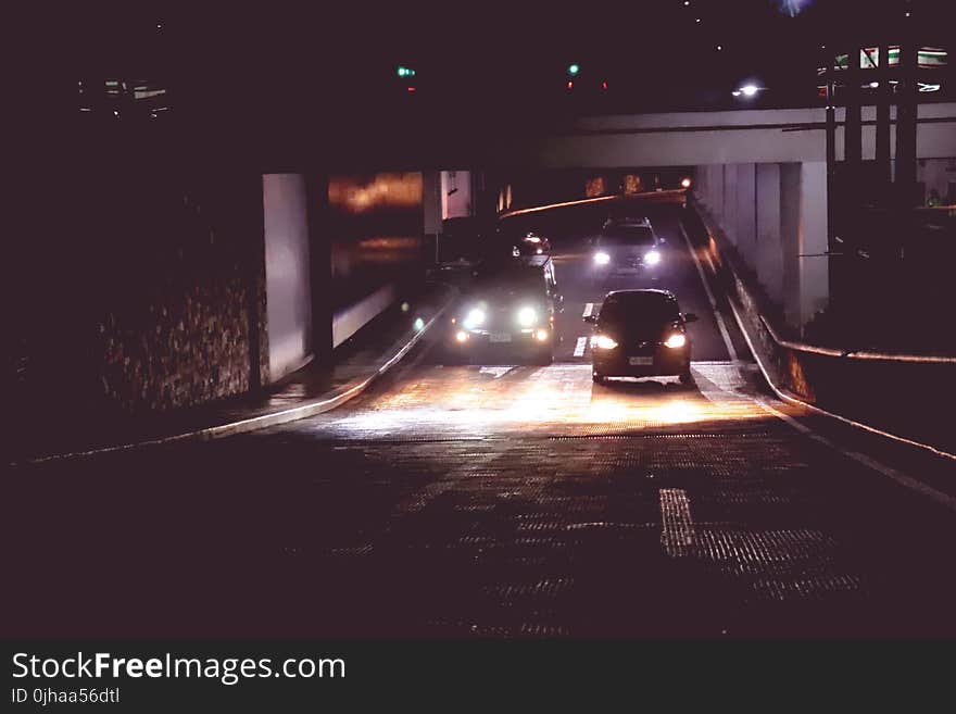 Photo of Cars in Tunnel during Nightime