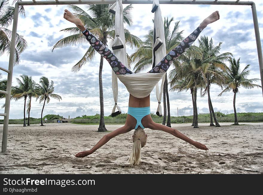 Woman Doing Anti-Gravity Yoga