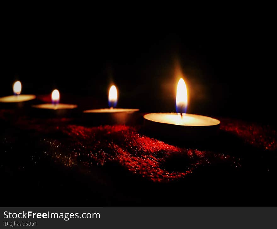 Four Lighted Candles