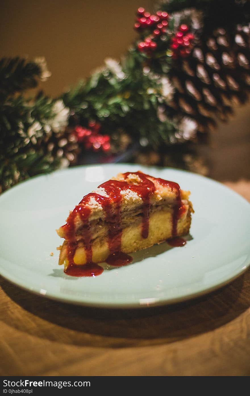 Round White Ceramic Plate With Piece of Cake