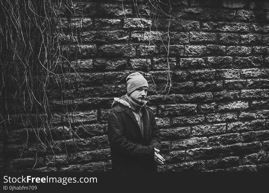 Person Standing Wearing Black Coat