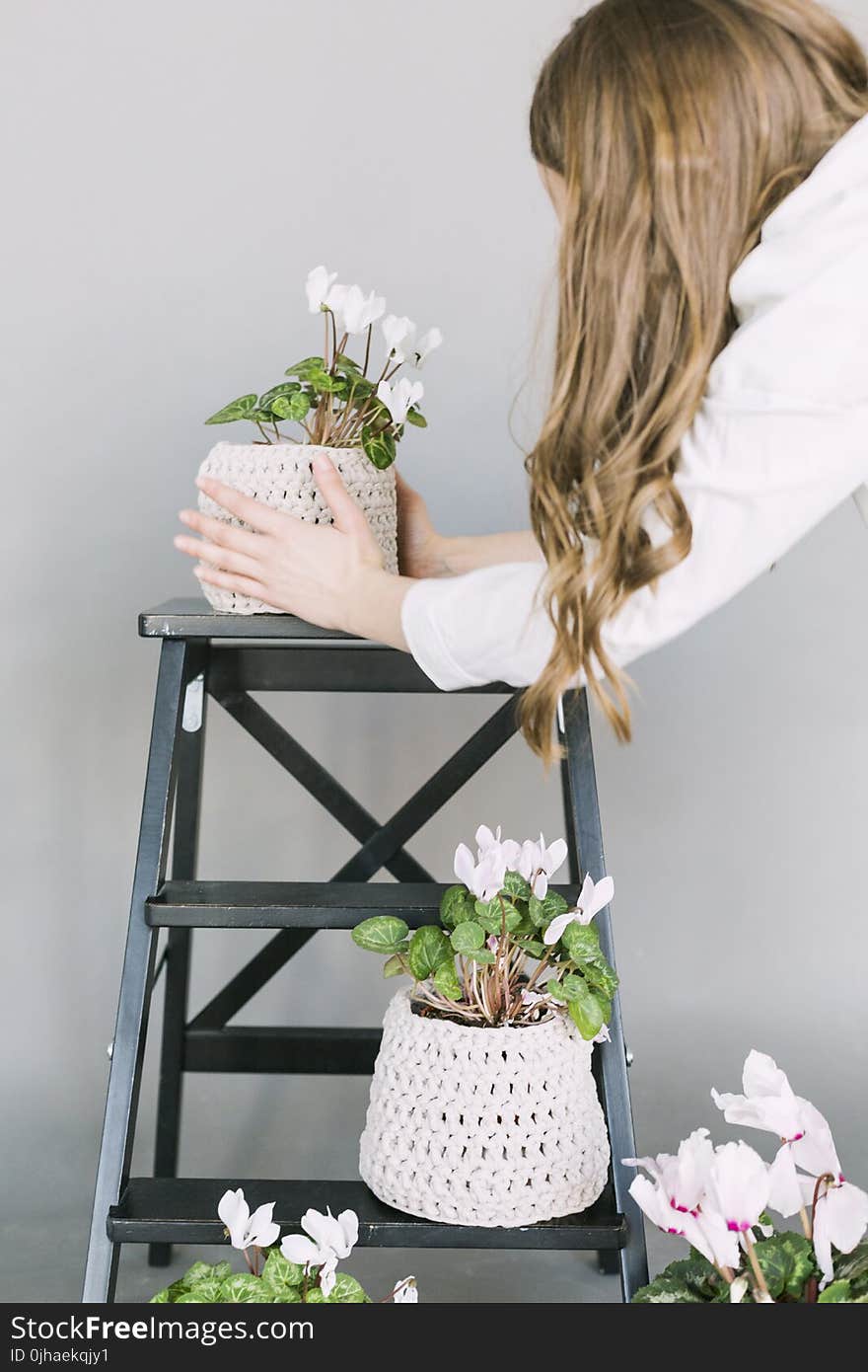 Woman Taking Care Plants