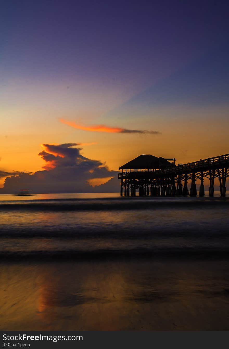 Photography of a Dock During Sunset