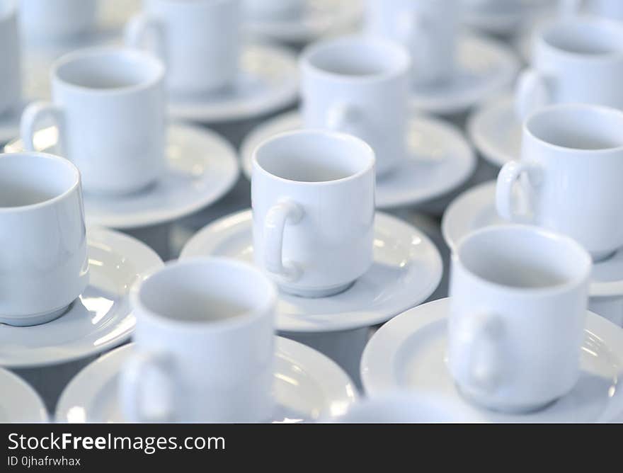 White Ceramic Teacups With Saucers