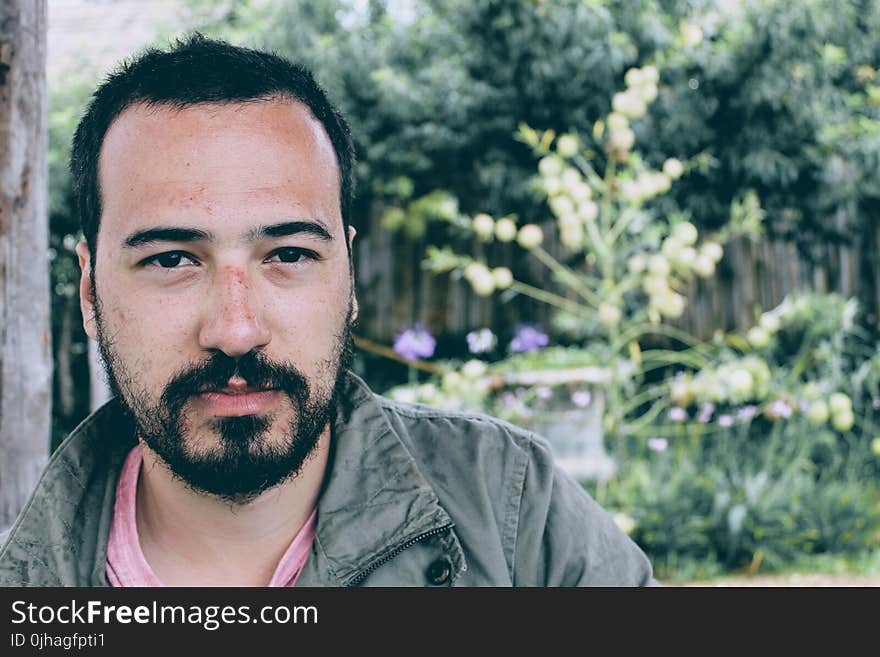 Close-up Photography of Bearded Man