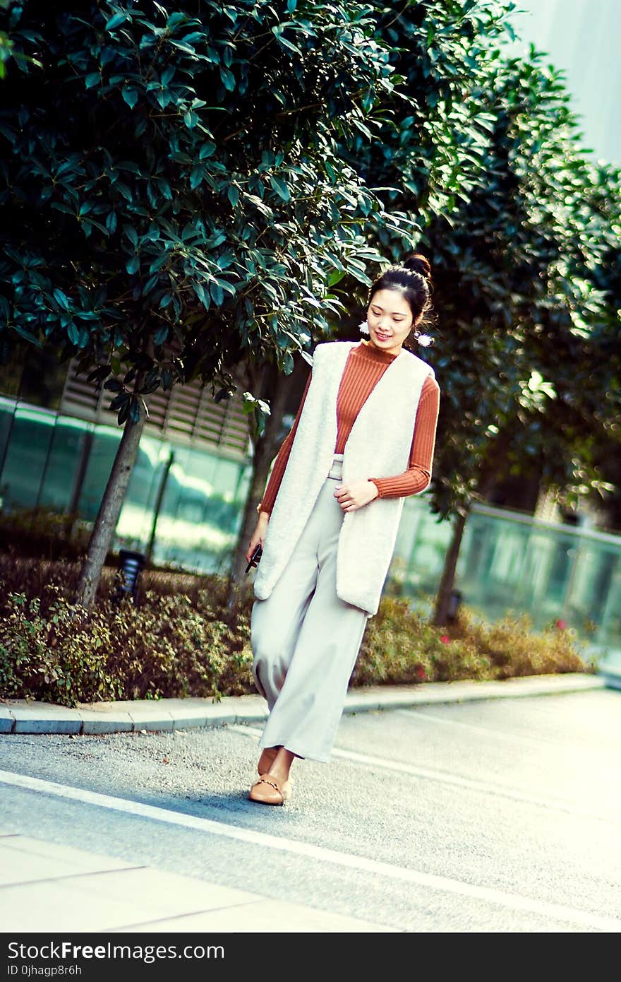 Photography of A Woman Walking