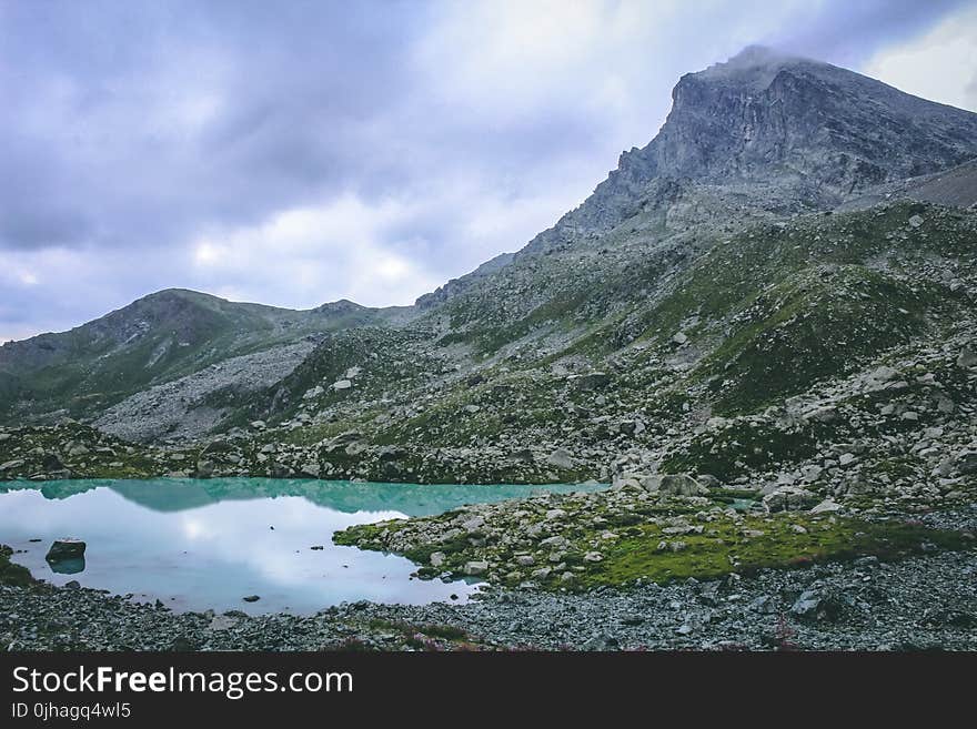 Mountain Near Body of Water