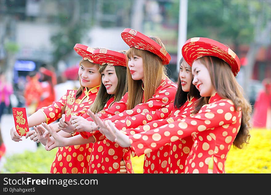 Five Women In Red And White Polka Dot Cheongsam Dress Standing