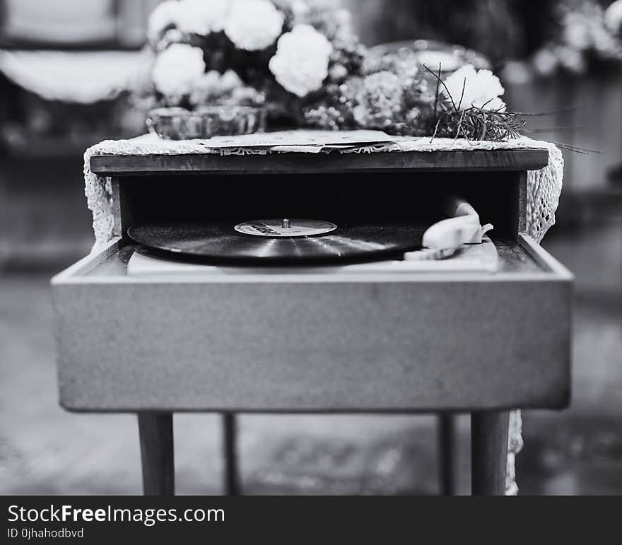 Grayscale Photo Of Vinyl Record Album Playing In Turntable