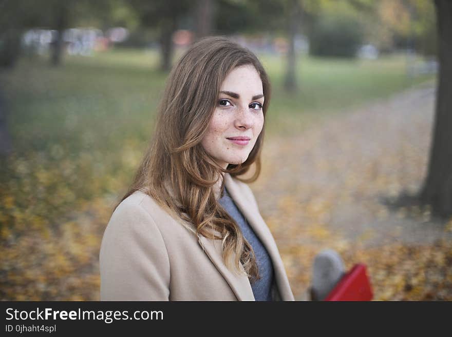 Brown-haired Woman Wearing Brown Blazer Focus Photo