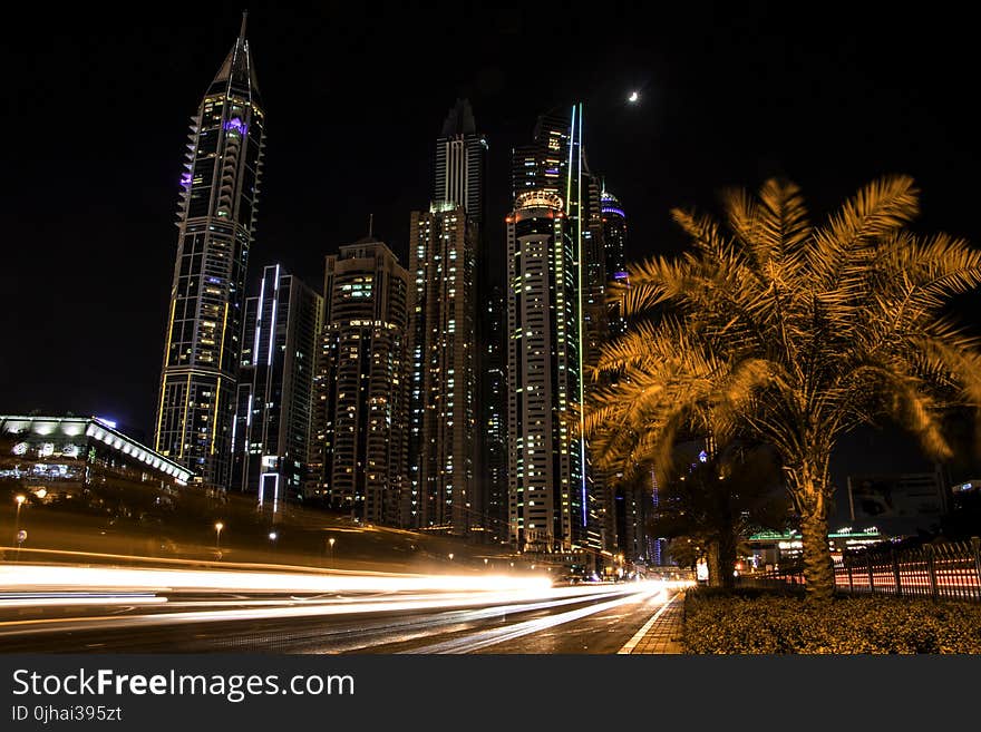 Timelapse Photo of High Rise Concrete Buildings