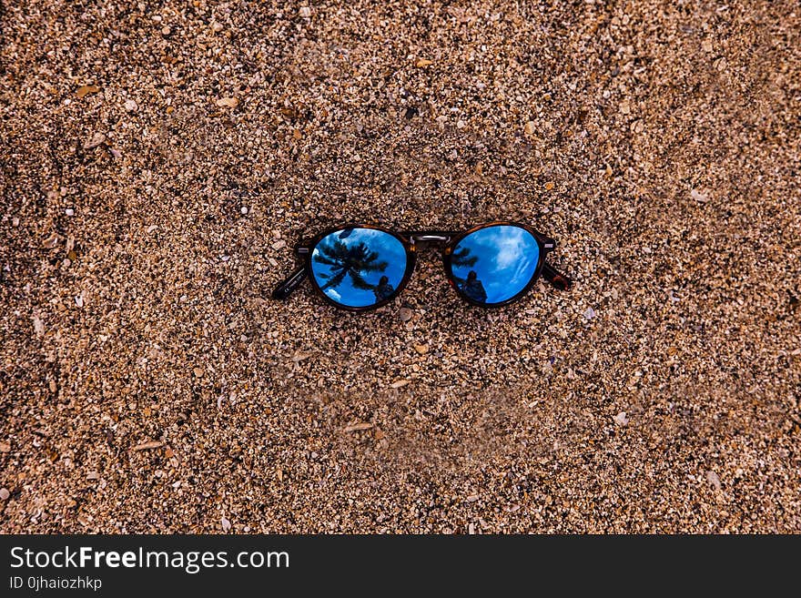 Photo of Sunglasses in the Ground