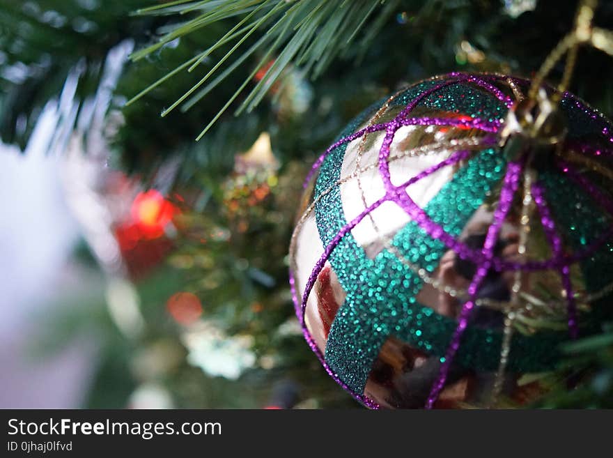 Close Up Photo of Gray and Multicolored Bauble