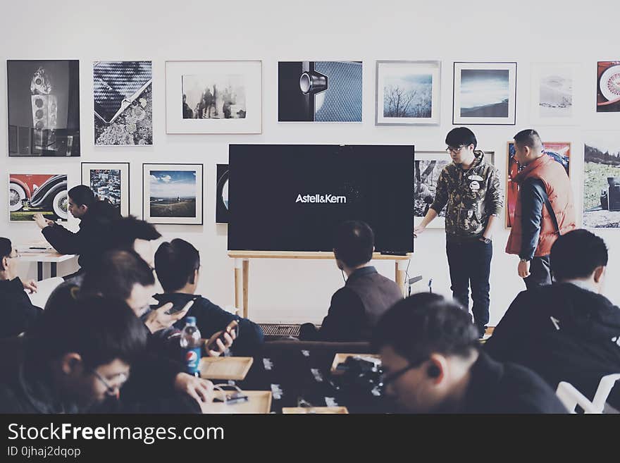 Group of People in Art Exhibit