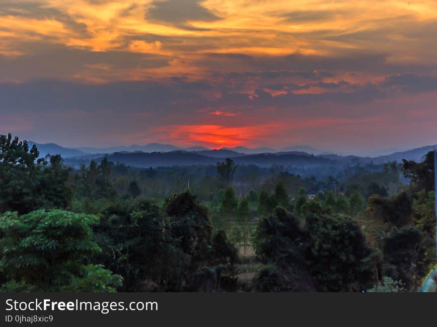 Scenic View of Mountains During Sunset