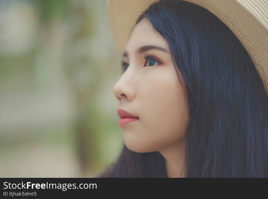 Woman Wearing Brown Fedora Hat