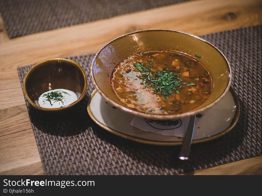 Brown Ceramic Bowl With Brown Soup