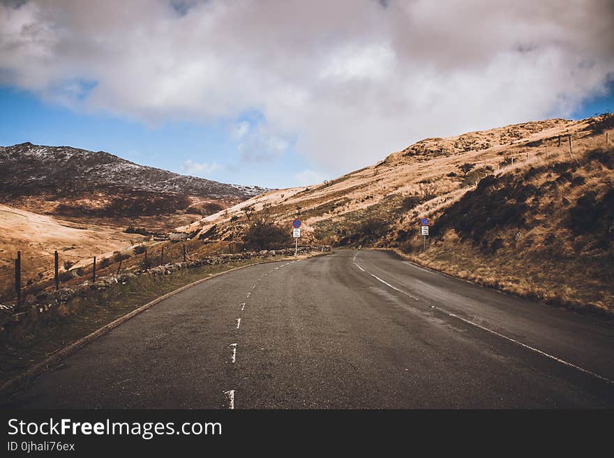 Concrete Road Near Mountains