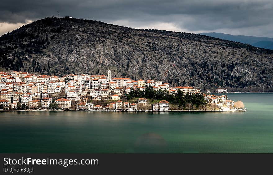 Photo of Concrete Houses Near the Sea