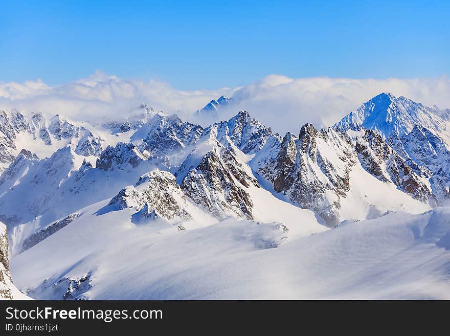 Mountain Ranges Covered in Snow