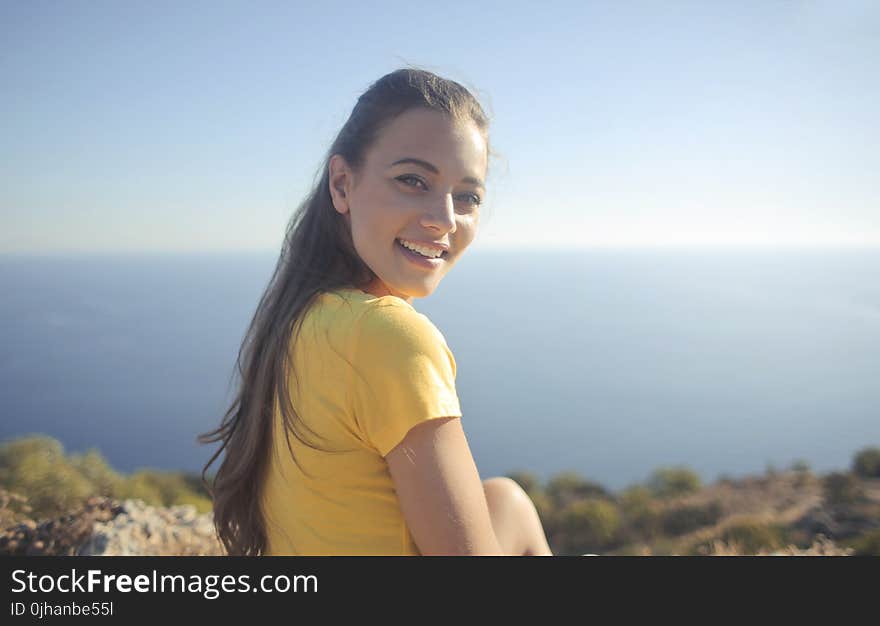 Woman Wearing Yellow Shirt