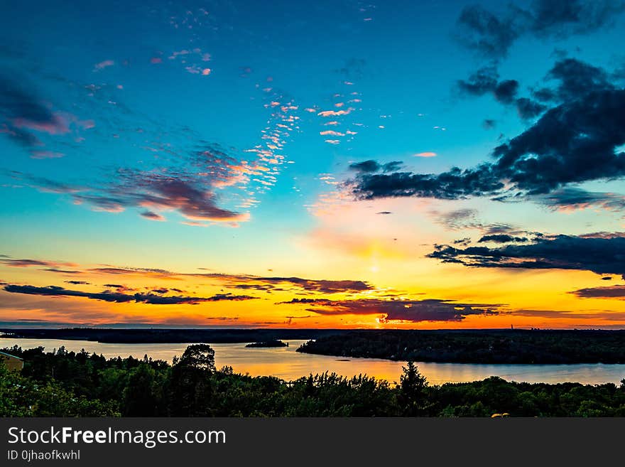 Silhouette of Island during Sunset