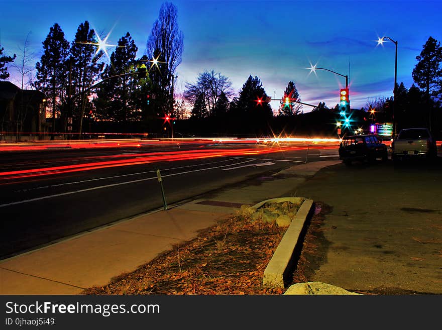 Time Lapse Photo of Cars During Dawn