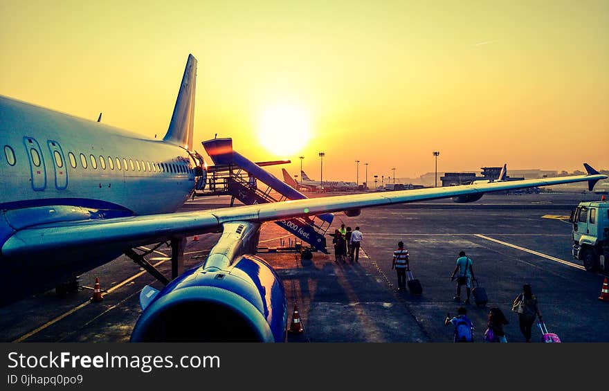 Photography of Airplane during Sunrise