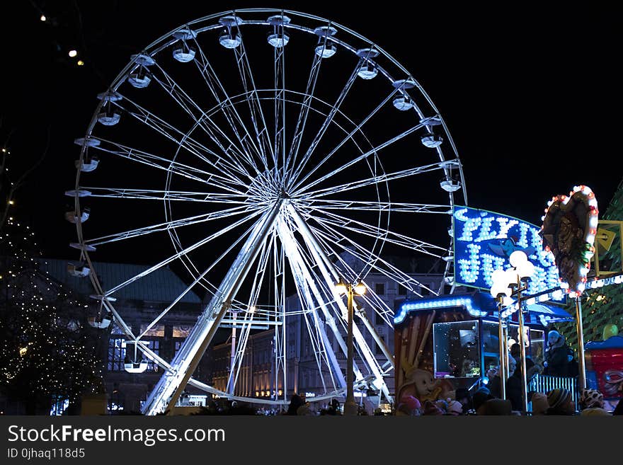 White Lighted Ferris Wheel in Amusement Part