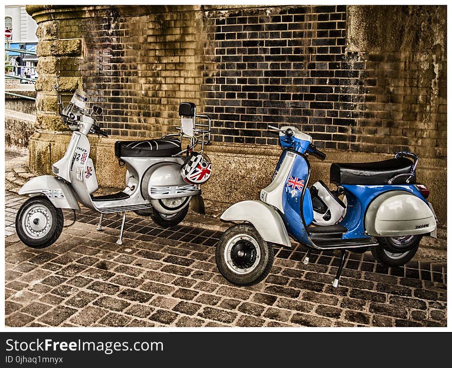 White and Blue Scooter Motorcycles