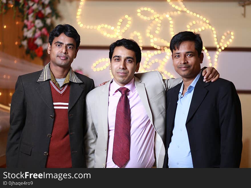 Three Men in Formal Suits