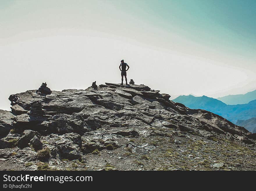 Person Standing on the Cliff