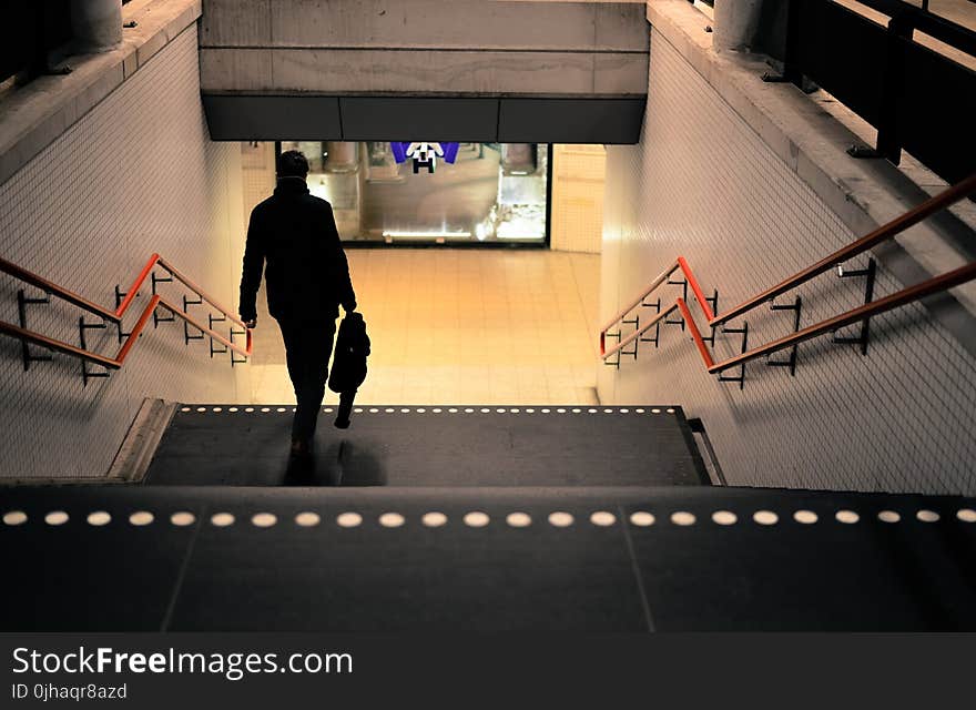 Photo Of Person Going Down The Stairs