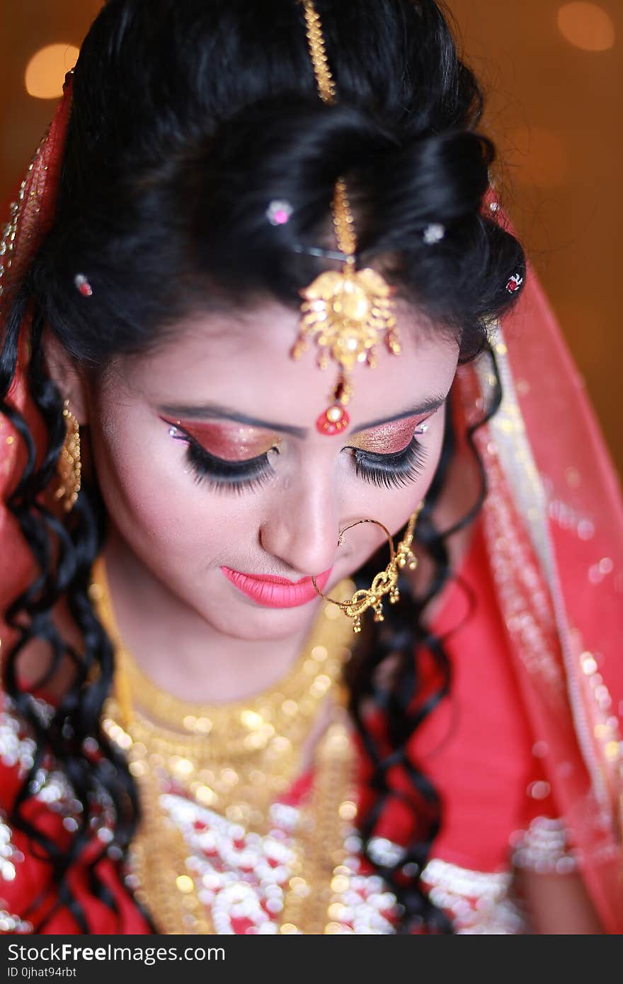 Woman Wearing Traditional Dress and Accessories