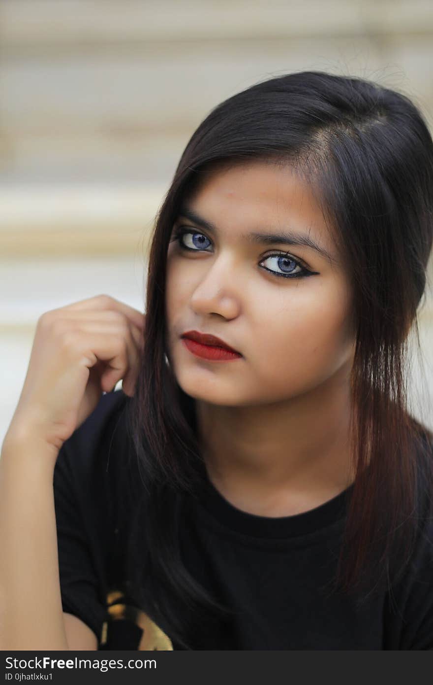 Shallow Focus Photography of Woman in Black Crew Neck Shirt