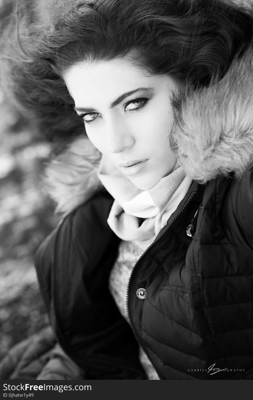 Photo of Woman Wearing Brown and Black Zip-up Parka Jacket