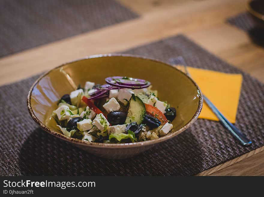 Vegetable Slices on Brown Ceramic Bowl