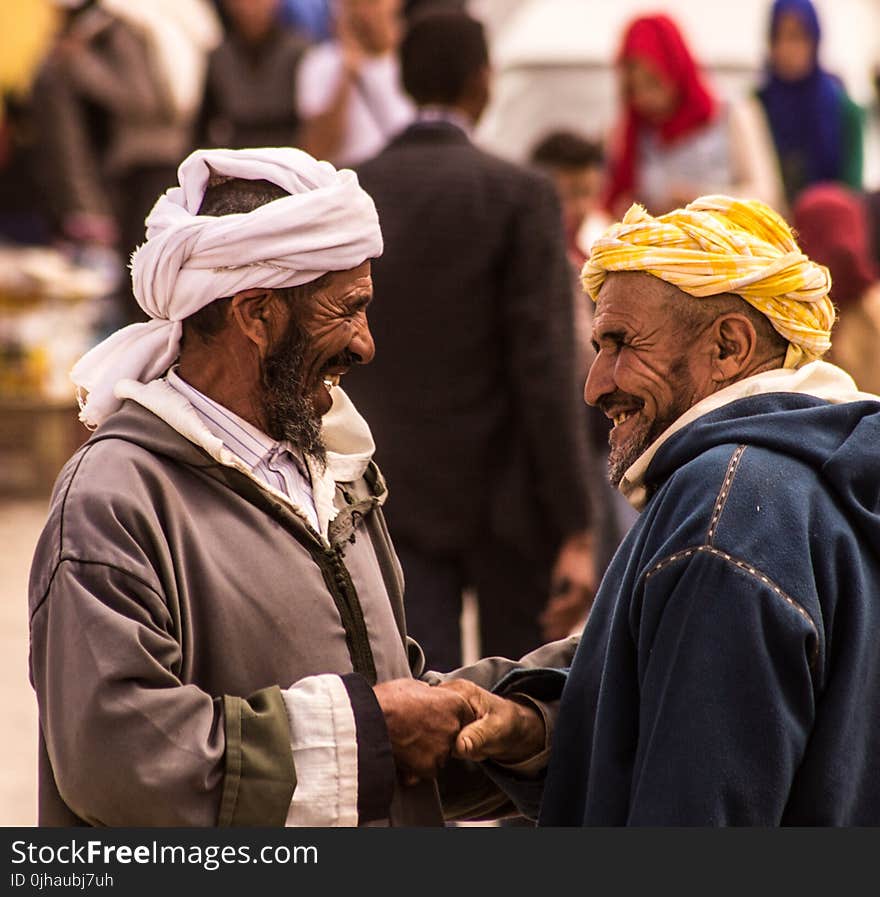 Two Man Smiling Each Other