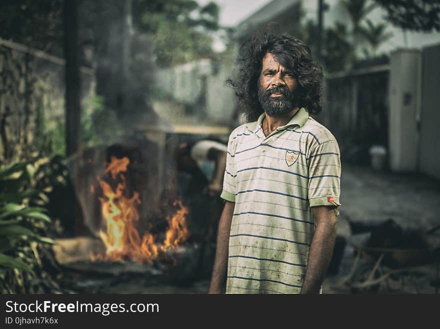 Photo of Man Wearing Dirty Shirt