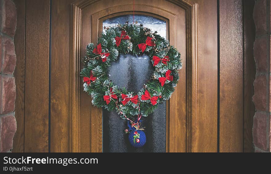 Green and Red Christmas Wreath on Door