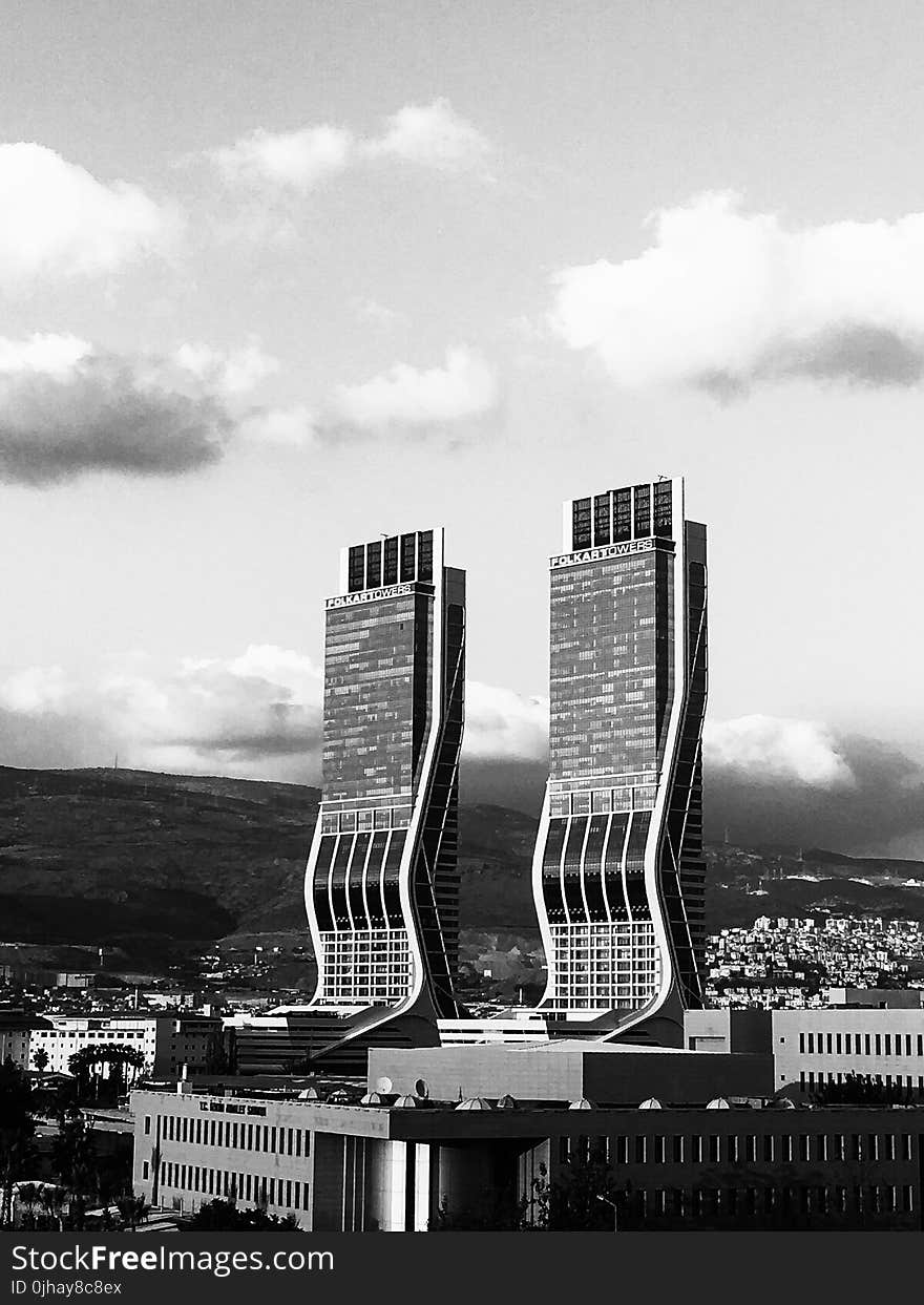 Greyscale Photography of Two High Rise Buildings