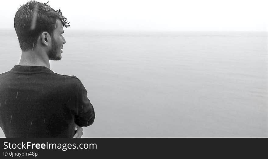 Gray Scale Photo Of Man Wearing Black Shirt