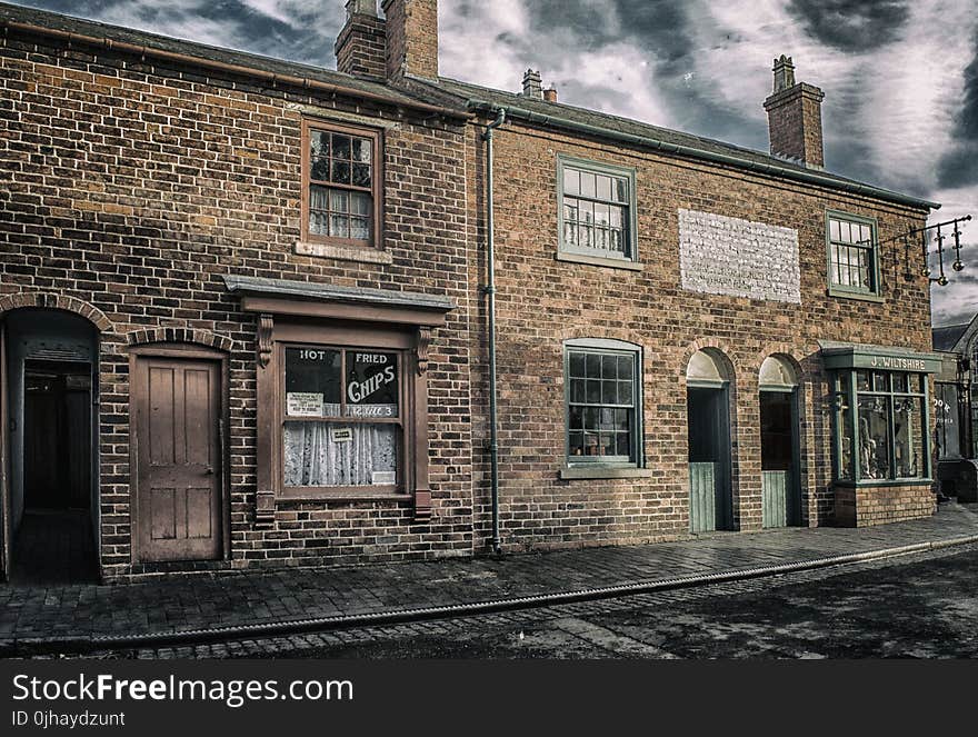 Architectural Photography of Brown Brick Building