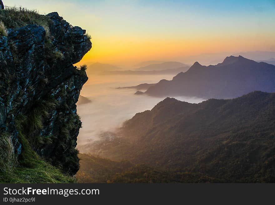 Foggy Mountains at Sunset