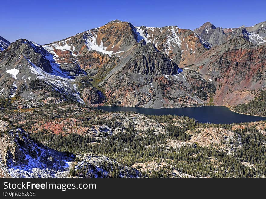 Grey and Brown Rocky Mountain Near the River