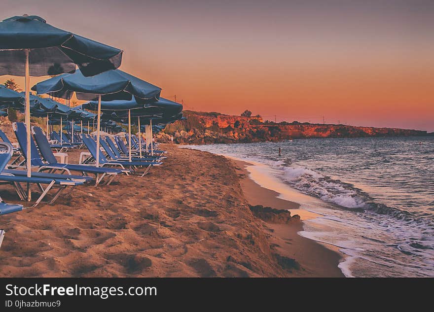 House and Parasols Near Beach