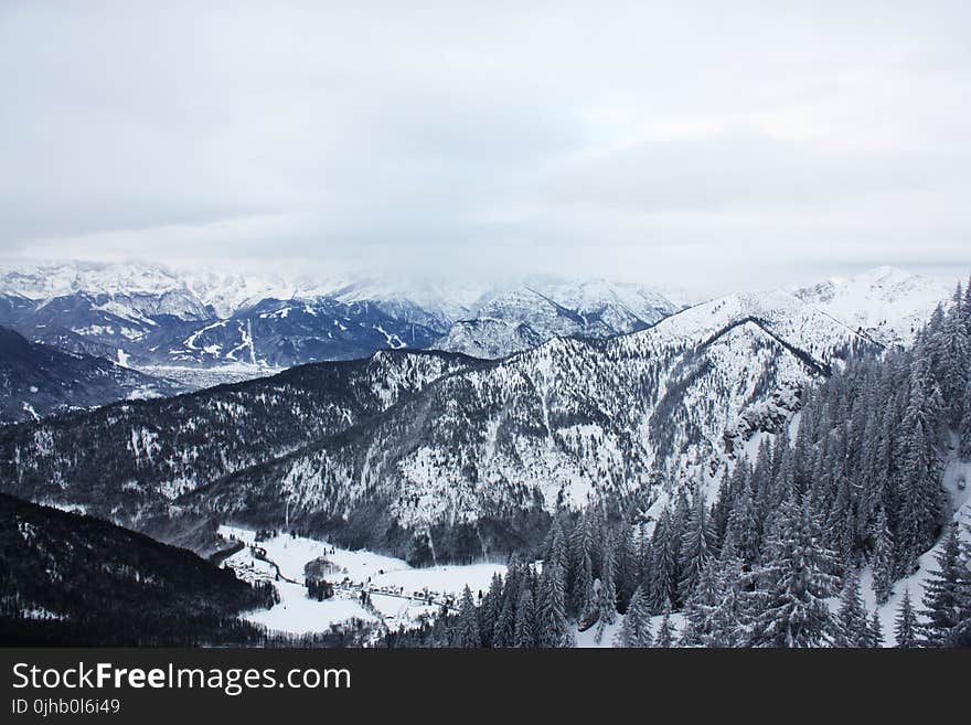 Scenic View of Mountains Covered with Snow