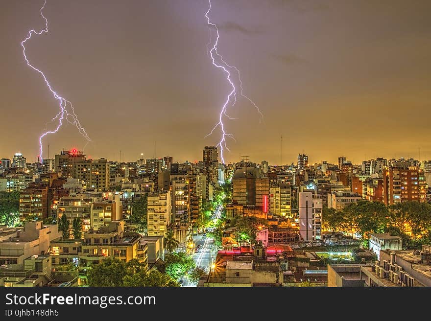 Photography of Thunder Strike Behind City