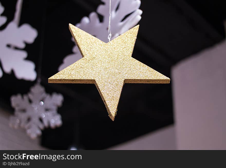 Close-up Photography of Star Covered with Glitters