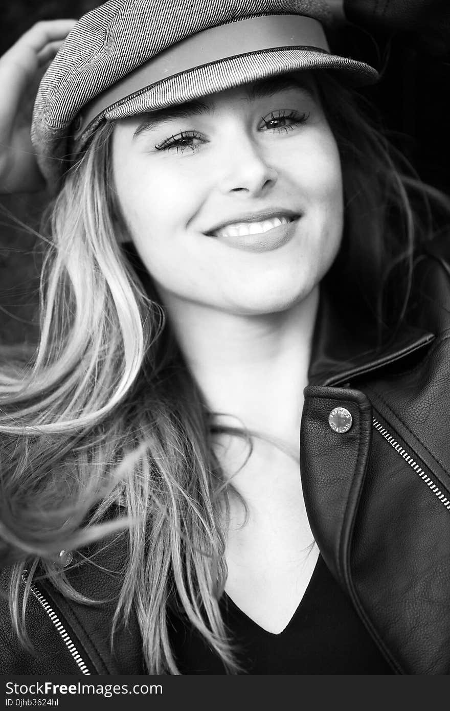 Grayscale Photography of Woman Wearing Hat